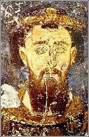 Slightly damaged painting of a bearded middle-aged man, wearing a golden diadem